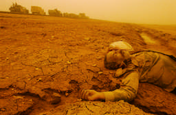 An Iraqi soldier lay in a ditch after a firefight with Marines in southern Iraq